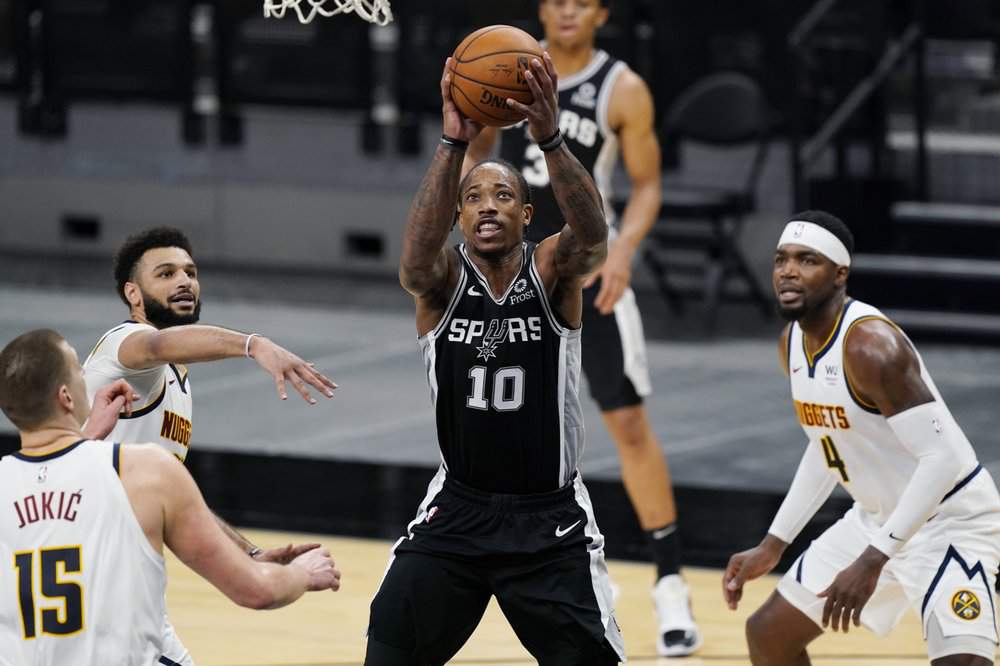DeRozan leads Spurs to 119-109 win, ending Nuggets’ streak