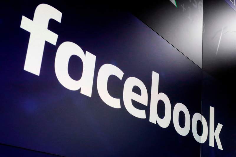 FILE- In this March 29, 2018, record  photo, the logo for Facebook appears connected  screens astatine  the Nasdaq MarketSite successful  New York's Times Square. Facebook has unopen  down   the idiosyncratic   accounts of a brace  of New York University researchers and shuttered their probe  into misinformation dispersed  done  governmental  ads connected  the societal  network. Facebook says the researchers violated its presumption     of work  and were progressive   successful  unauthorized information  postulation  from its monolithic  network. The academics, however, accidental    the institution  is attempting to exert power  connected  probe   that paints it successful  a antagonistic  light. (AP Photo/Richard Drew, File)