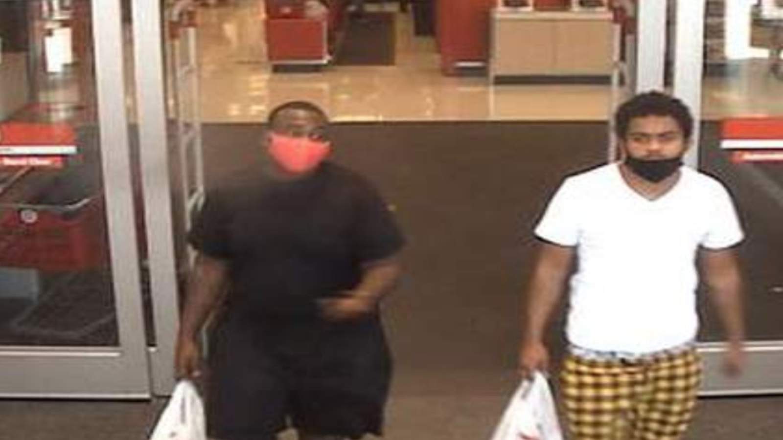2 wanted after shopper robbed, dragged by vehicle outside Target at The Rim, police say