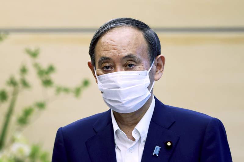 Suga bows out of party vote, paves way for new Japan leader