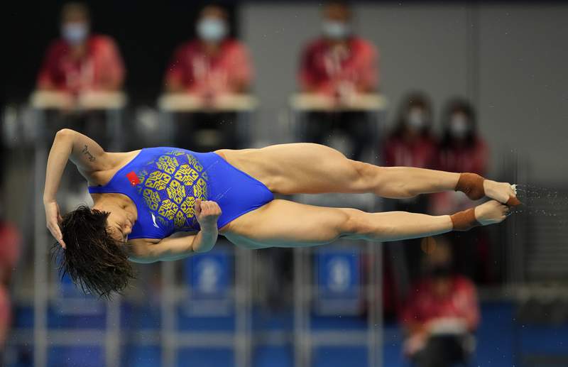 Shi , Wang lead the way again in Olympic springboard diving