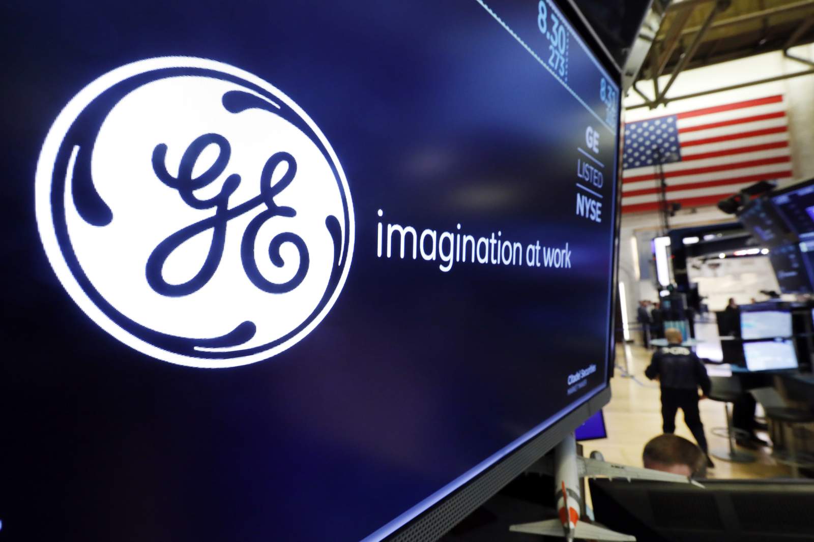 General Electric's 3Q adjusted profit surprises Wall Street