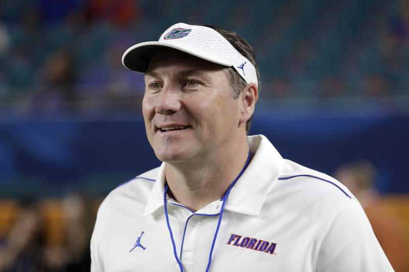 Florida gives Mullen 3-year extension, $1.5M raise annually