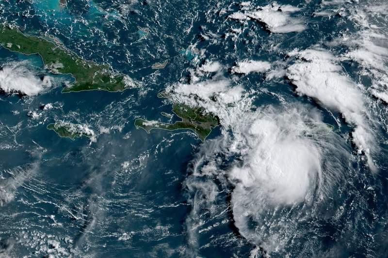 Fred weaker, but likely to drench Florida as tropical storm