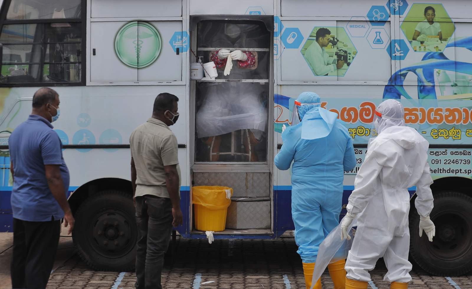 The Latest: Sri Lanka bans gatherings amid virus cluster