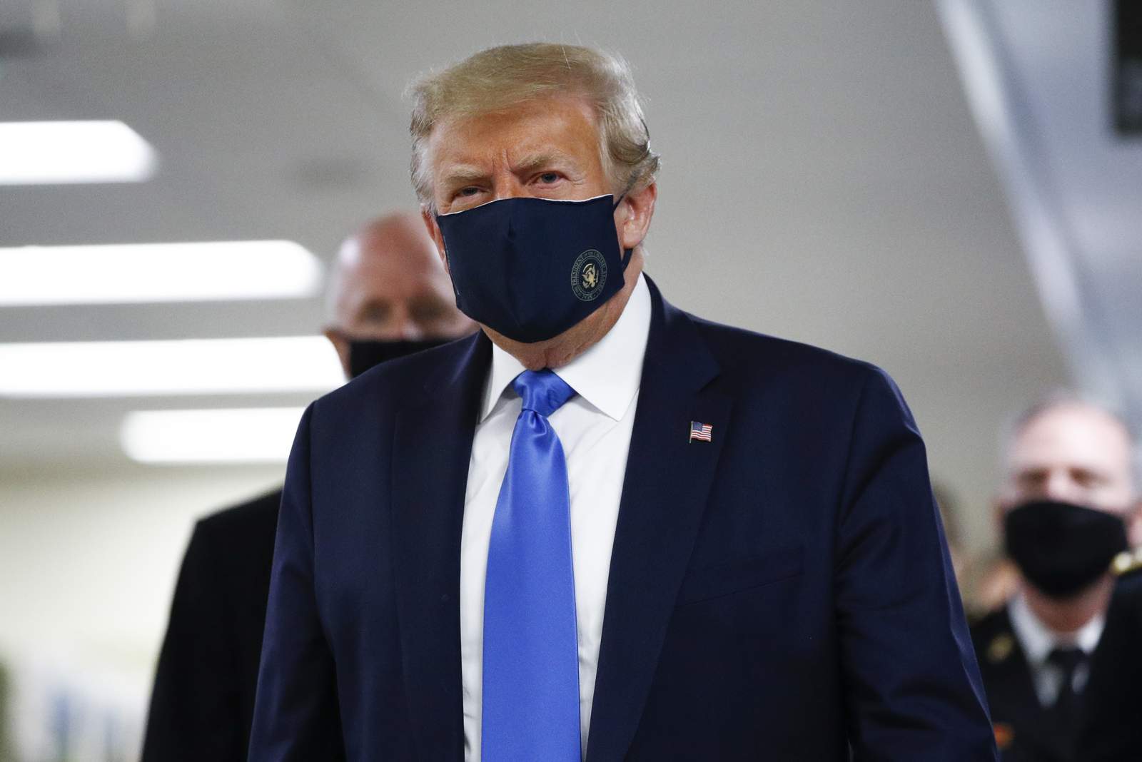 President Trump wears mask in public for first time during pandemic