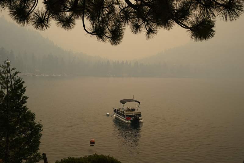 Crews struggle to stop fire bearing down on Lake Tahoe