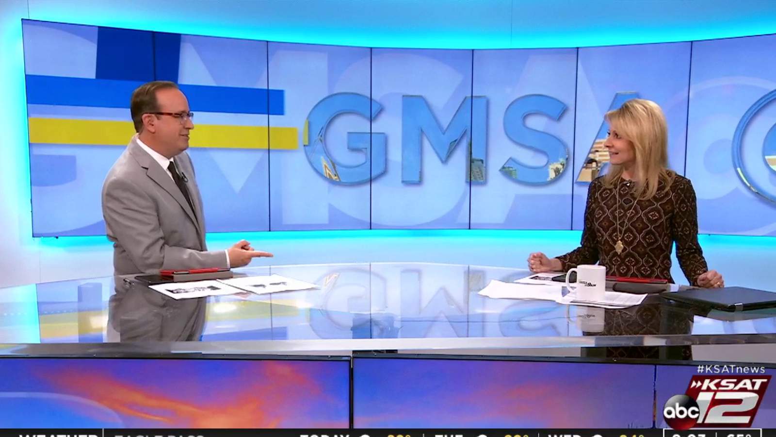 VIDEO: GMSA anchors Mark Austin, Leslie Mouton practice social distancing during newscast