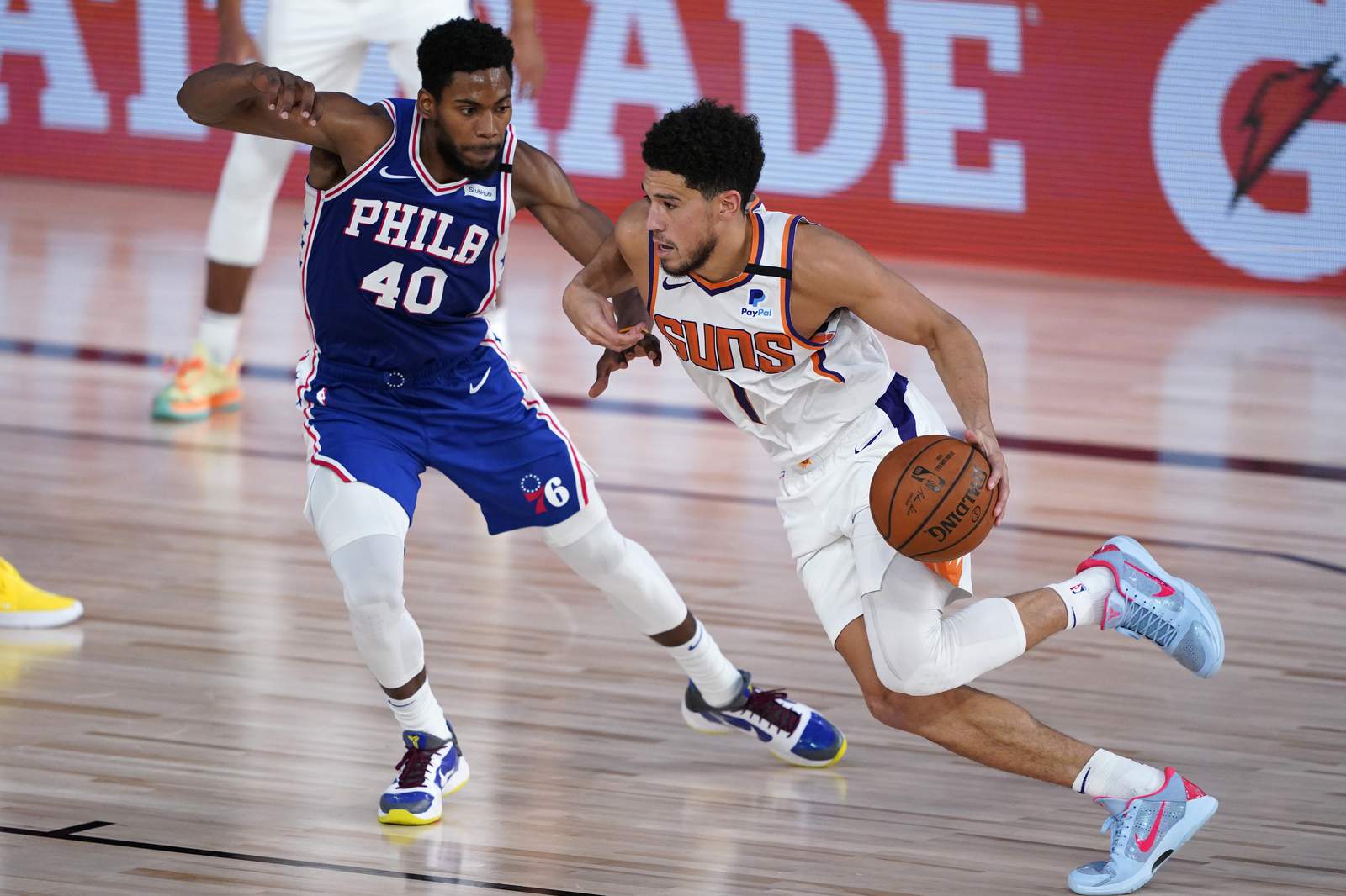 Booker's 35 points help streaking Suns beat 76ers 130-117