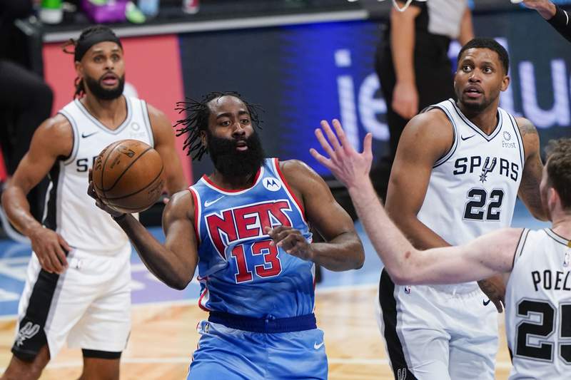 Harden returns to score 18 points, Nets beat Spurs 128-116