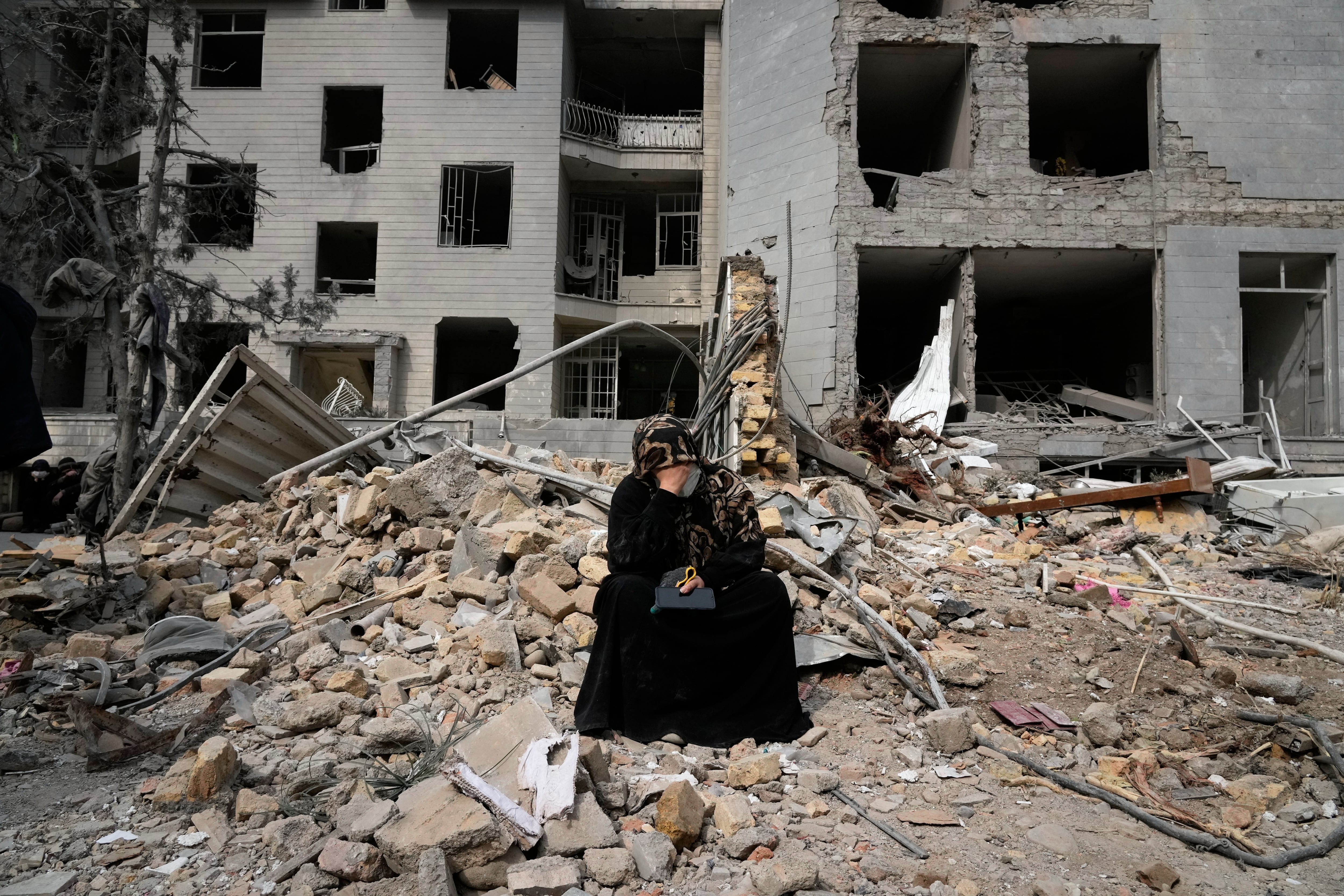 The Latest: Crude oil hits $100 a barrel as Iran vows to keep fighting  after 6,000 US airstrikes