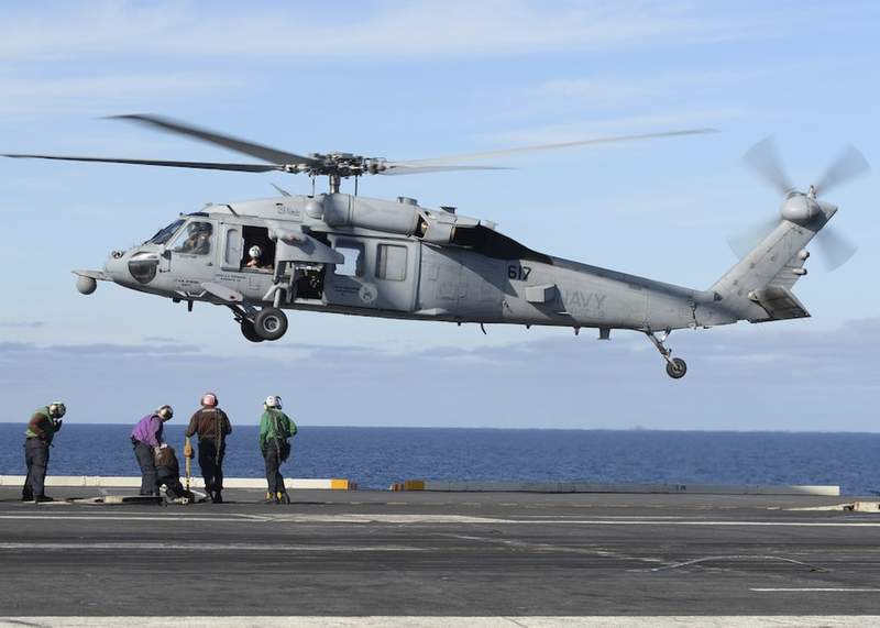 FILE - In this March 19, 2017, record  photo, released by the U.S. Navy, an MH-60S Sea Hawk chopper  prepares to onshore  connected  the formation  platform  of the craft  bearer  USS Nimitz successful  the Pacific Ocean. The remains of 5  radical   and the wreckage of a U.S. Navy chopper  that crashed successful  the Pacific Ocean disconnected  California person  been recovered, the Navy said successful  a connection    Tuesday, Oct. 12, 2021. An MH-60S helicopter, akin  to the 1  pictured, its 2  pilots and 3  different   sailors were mislaid  successful  an Aug. 31 mishap  astir  69 miles (111 kilometers) disconnected  the San Diego coast. (Mass Communication Specialist Seaman Ian Kinkead/U.S. Navy via AP, File)