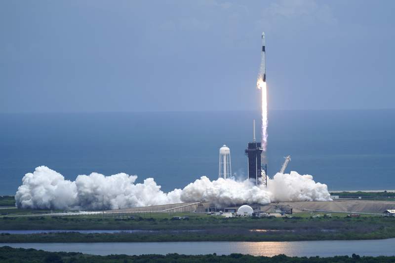 SpaceX launches tiny critters, solar panels to space station