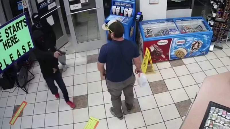 Video shows Marine veteran disarm gun-wielding robber at Arizona gas station
