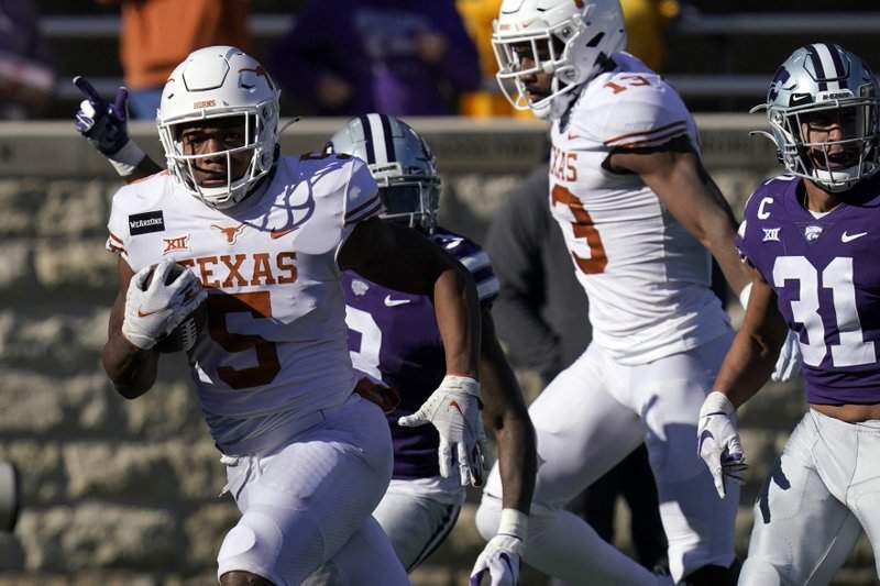 Texas RBs pile up 311 yards, 6 TDs, clobber K-State 69-31