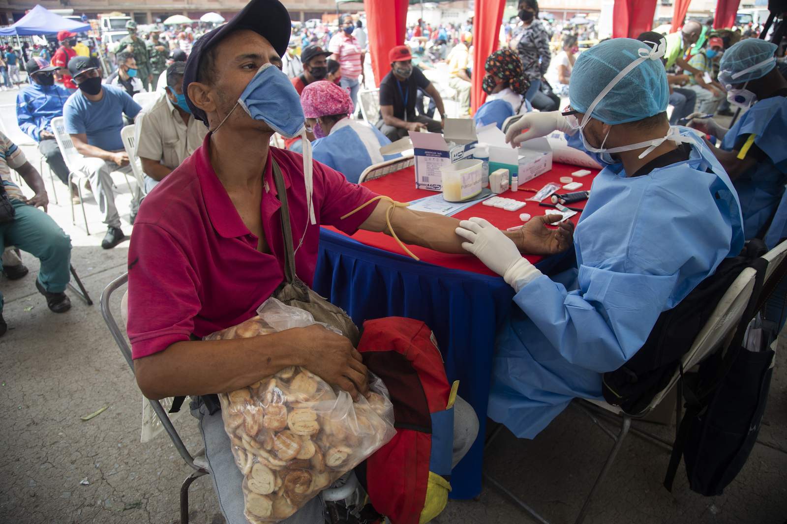 Virus hits Venezuelan city, raising fears of broader crisis