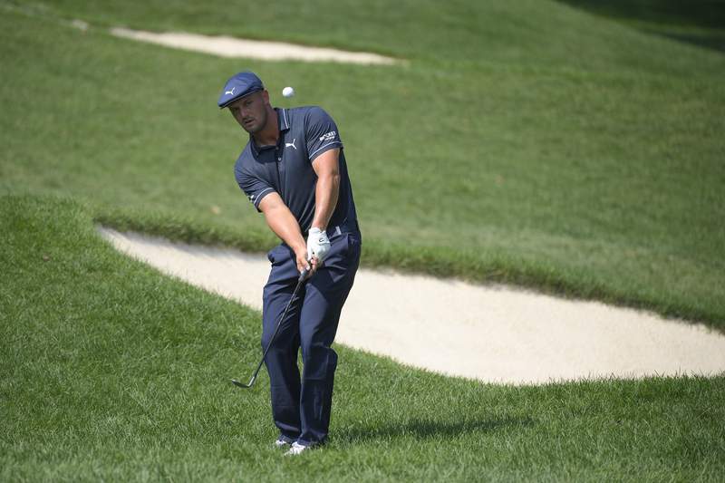 DeChambeau overpowers Caves Valley and narrowly misses a 59