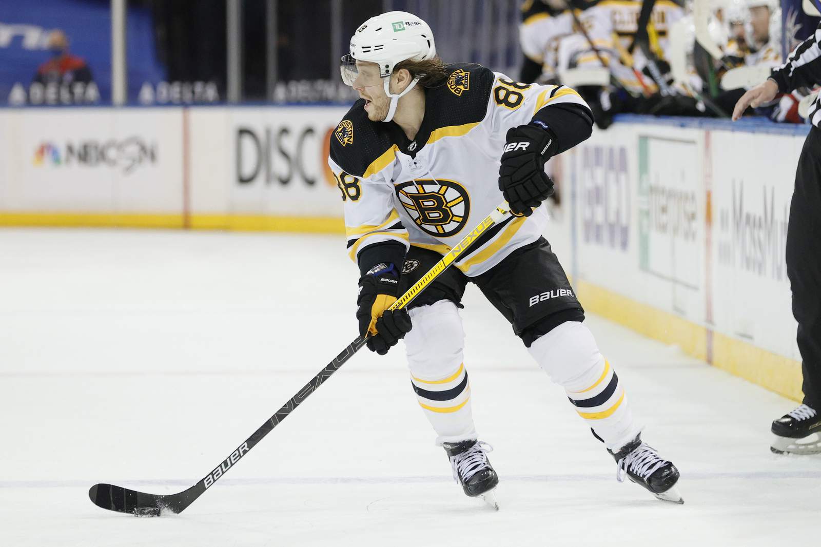 The Latest: Boston's Charlie Coyle enters NHL COVID protocol
