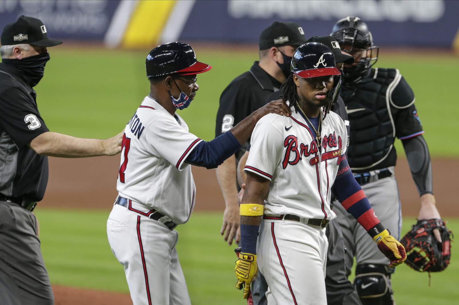 Acuña HR, plunked again, Braves top Marlins 9-5 to open NLDS