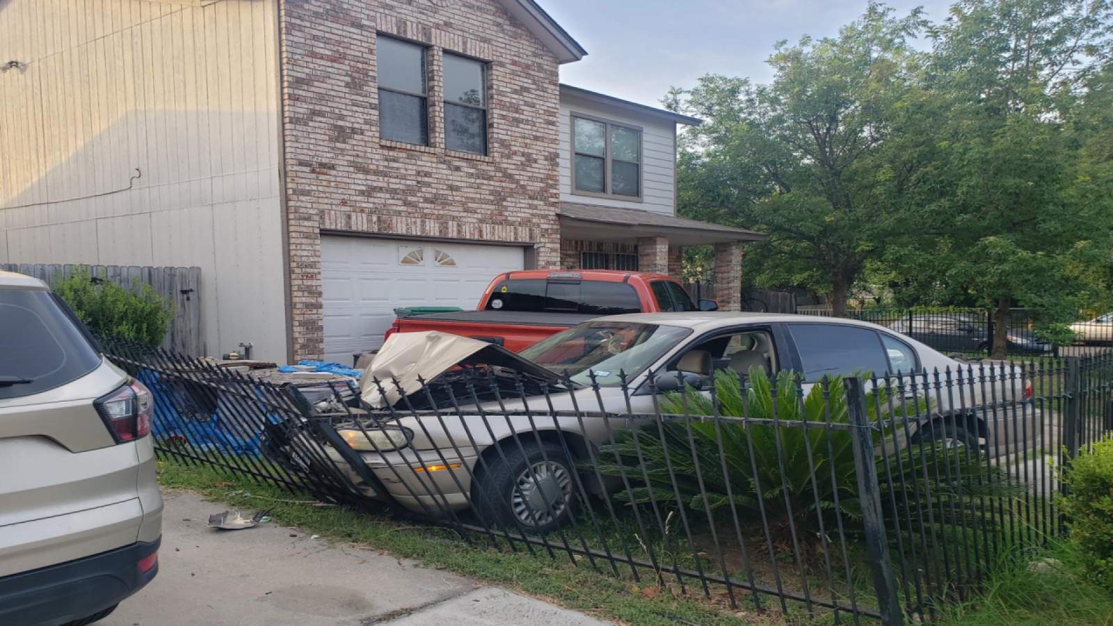 Driver crashes car after being shot in west Bexar County neighborhood