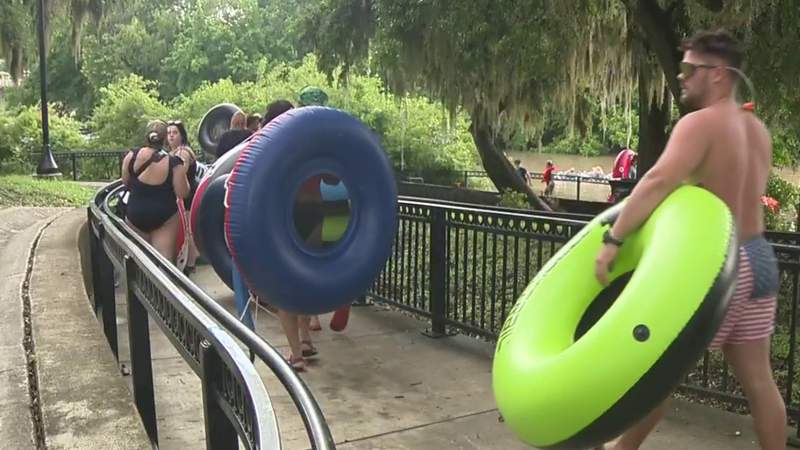 Despite scattered showers, visitors still packing the Comal River ahead of Memorial Day