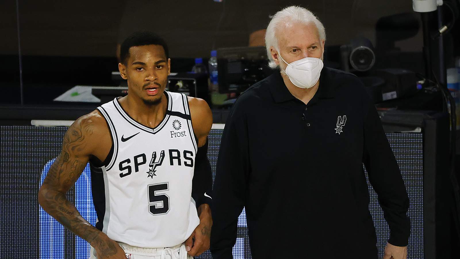 Popovich says no positive COVID cases to start practice, but pair of key Spurs players could miss time